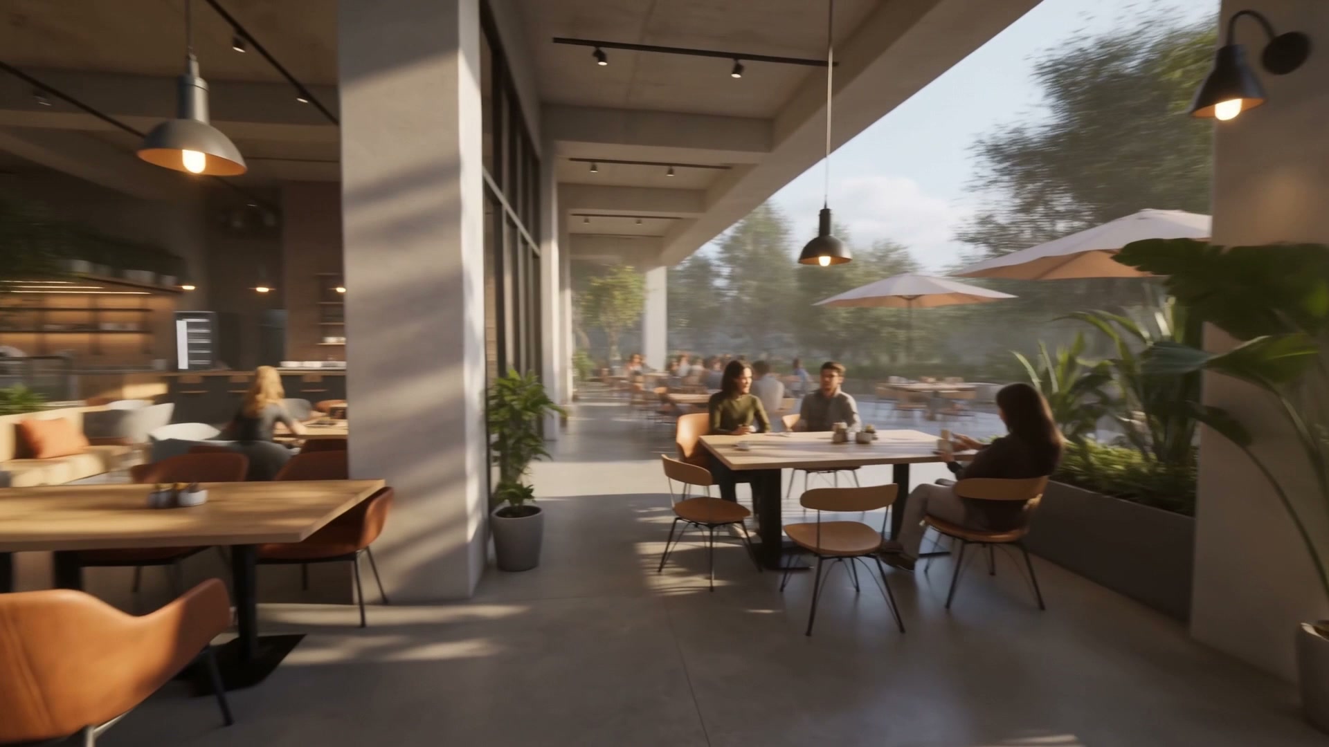 The terrace under umbrellas, tables among plants